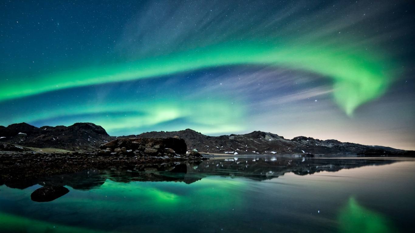 Northern lights over an Iceland landscape